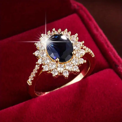 Sapphire-Blue Oval Halo Gold Ring